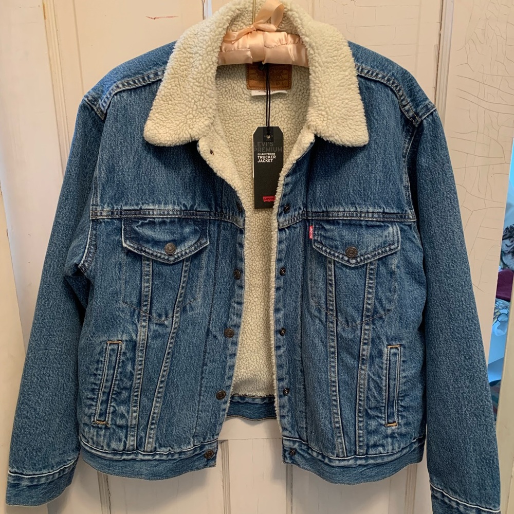 Levi’s denim blue trucker jacket, new with tags.